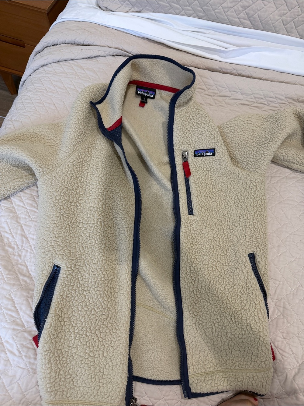 Patagonia Cream Sherpa Jacket with Navy Trim and Red Accents